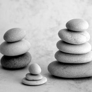 Children Arrangements represented as two large and one small stacks of pebbles by Divorce Finance & Children Solicitor, Keats Family Law