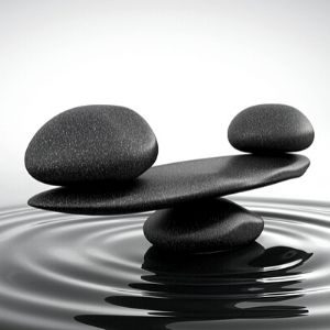 Support in mediation represented as balancing pebbles by Divorce Finance & Children Solicitor, Keats Family Law
